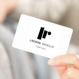 Promotional image of a hand holding a white Lacson Ravello digital gift card