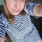 Black Striped T Shirt Dress | Black and White Stripe Shirt Dress | Shop the Saleya Dress in black and white stripes from Lacson Ravello. Made with a soft bamboo blend fabric, this versatile year-round wardrobe staple features a classic bateau neckline, elbow-length sleeves, and pockets. Perfect for everyday wear.
