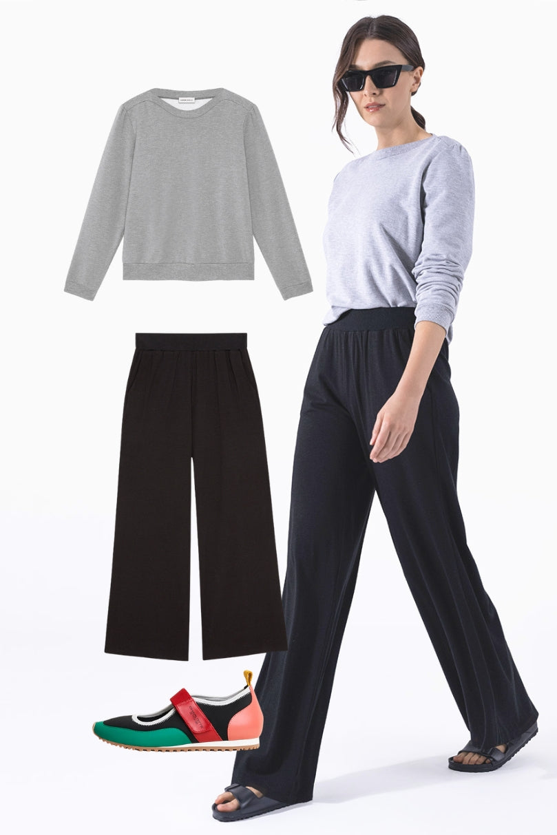Model wearing black Vivian wide-leg pants with a light grey sweatshirt  | Palazzo Pant for Women | Comfortable Wide Leg Pants | Black Knit | Lacson Ravello